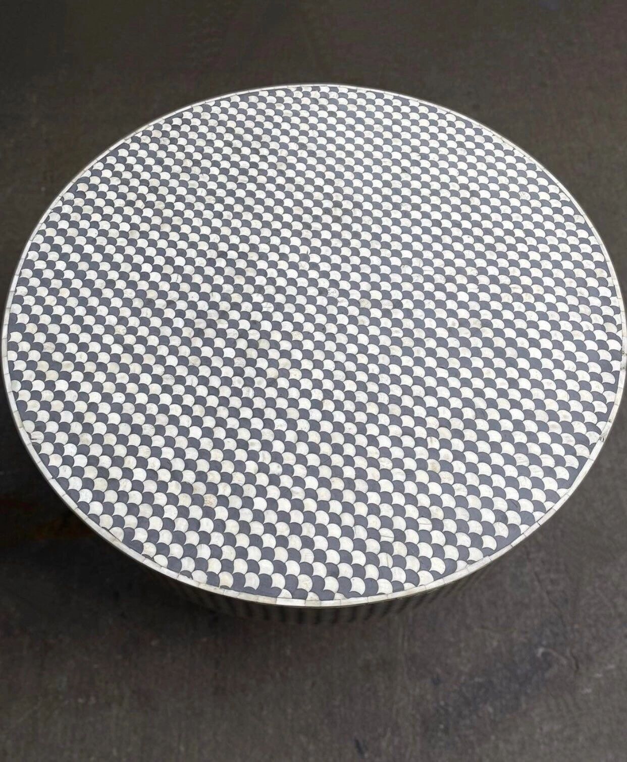 Heritage inlay pattern on wooden round coffee table