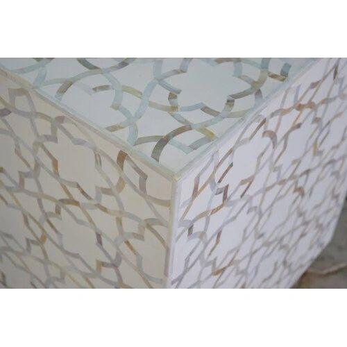 Mother of pearl inlay star pattern with brass metal base on wooden rectangle coffee table